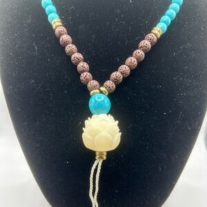 Elegant Turquoise and Brown Beaded Necklace